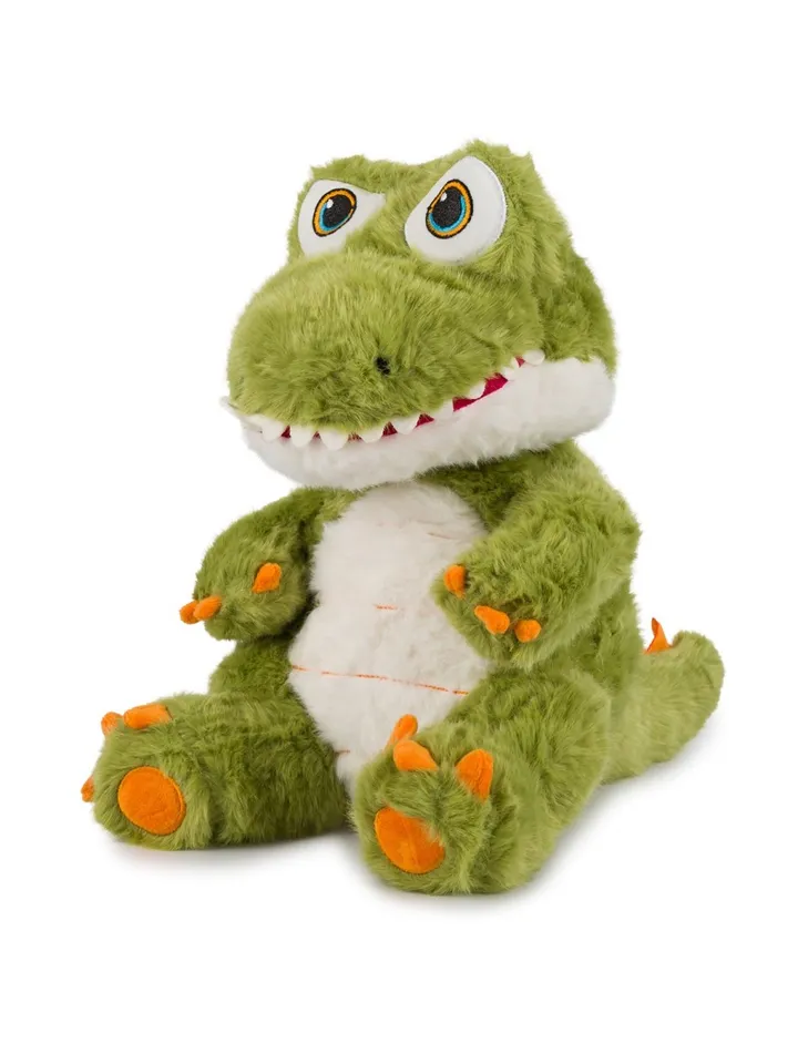 Siedzący zielony pluszowy krokodyl z białym brzuszkiem i pomarańczowymi pazurkami